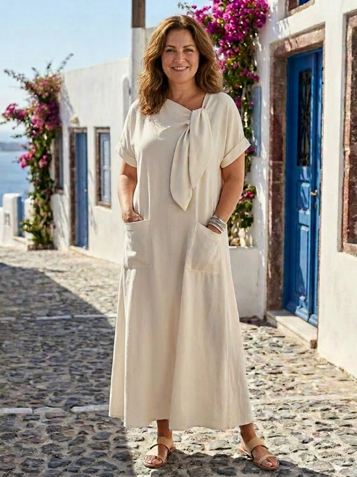 Elowyn | Elegant and comfortable long dress with a round neckline, short sleeves, and a practical pocket