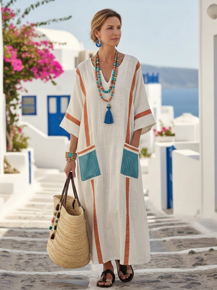 Noemi | Comfortable long dress with a V-neck, short sleeves and practical pockets