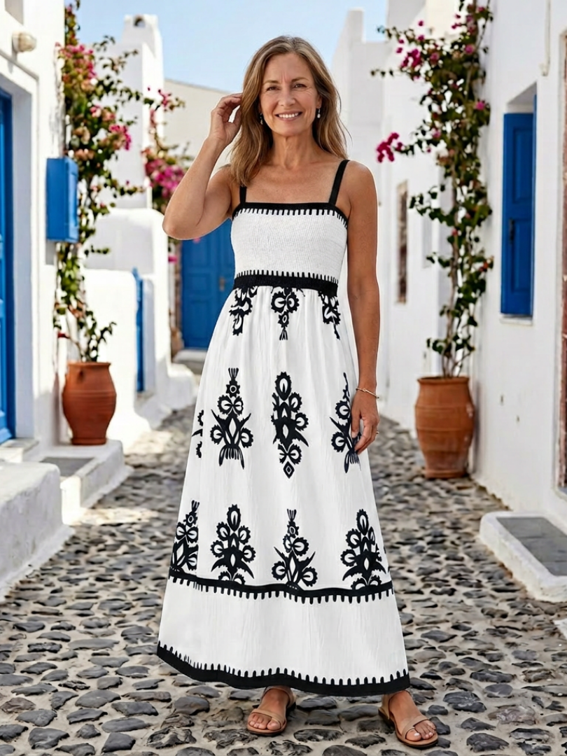Odelina | Elegant and comfortable maxi dress with a smocked bodice, sleeveless